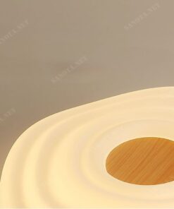 Đèn ốp trần LED vintage SNT2916 mang phong cách hiện đại và tinh tế. Điểm nhấn của chiếc đèn này là thiết kế vòng tròn đa lớp, tạo nên một hiệu ứng thị giác ấn tượng với các vòng tròn nhỏ dần và chồng lên nhau