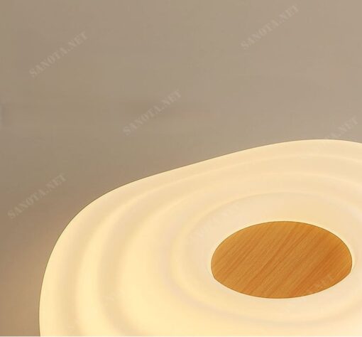 Đèn ốp trần LED vintage SNT2916 mang phong cách hiện đại và tinh tế. Điểm nhấn của chiếc đèn này là thiết kế vòng tròn đa lớp, tạo nên một hiệu ứng thị giác ấn tượng với các vòng tròn nhỏ dần và chồng lên nhau