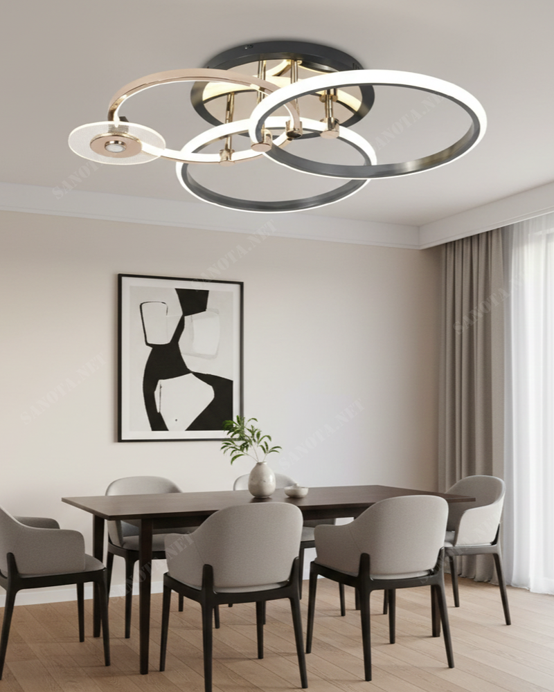 Đèn ốp trần vòng tròn xếp tầng SNT3502 với cấu trúc hình học động, gồm các vòng tròn lớn, dẹt. Tạo thành một bố cục xoắn ốc tinh tế, dường như....