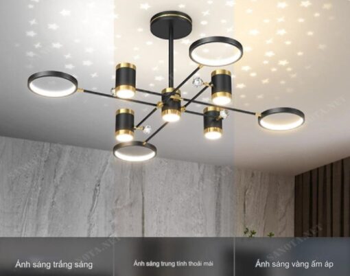 một chiếc đèn chùm led hiện đại theo văn phong review với thân đèn màu đen cá tính làm từ hợp kim vô chùng chắc chắn và bền bỉ theo thời gian, chiếc đèn là một chùm những vòng tròn đèn led được sắp xếp một cách độc đáo, kết hợp với những bóng đèn ánh sao, khi chiếc đèn được bật một vẻ đẹp lãng mạn khắp cả không gian, ánh sáng ấm áp, những vì sao sáng trên trần nhà, chiếc đèn led hiện đại này sẽ là món đồ trang trí không thể thiếu trong không gian nội thất nhà bạn, từ phòng khách đến phòng ngủ chiếc đèn này sẽ làm tốt các chức năng của nó