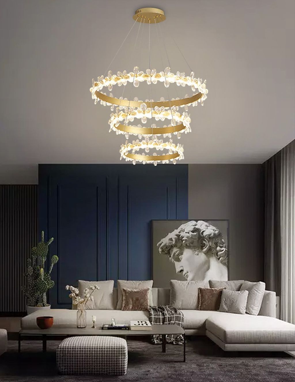 Chiếc đèn chùm nghệ thuật mà bạn đang chiêm ngưỡng không chỉ là một thiết bị chiếu sáng thông thường, mà là một kiệt tác nghệ thuật nội thất. Với thiết kế 3 vòng tròn xoắn tầng độc đáo, được đính kèm hàng loạt chi tiết pha lê trong suốt hình cánh bướm, sản phẩm tạo ra hiệu ứng ánh sáng lung linh, huyền ảo và đầy sang trọng. Mỗi đường nét được chăm chút tỉ mỉ, khiến không gian trở nên mềm mại, tinh tế và giàu cảm xúc.