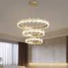 Chiếc đèn chùm nghệ thuật mà bạn đang chiêm ngưỡng không chỉ là một thiết bị chiếu sáng thông thường, mà là một kiệt tác nghệ thuật nội thất. Với thiết kế 3 vòng tròn xoắn tầng độc đáo, được đính kèm hàng loạt chi tiết pha lê trong suốt hình cánh bướm, sản phẩm tạo ra hiệu ứng ánh sáng lung linh, huyền ảo và đầy sang trọng. Mỗi đường nét được chăm chút tỉ mỉ, khiến không gian trở nên mềm mại, tinh tế và giàu cảm xúc.