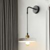 Đèn tường chao đá mài sợi khảm xà cừ được mài thủ công từ hỗn hợp bê tông đá rửa trộn với sợi thủy tinh composite. Mỗi chiếc đèn được mài thủ công bằng tay. Mang đến một vẻ đẹp mộc mạc, tinh tế mà không kém phần sang trọng. Với thiết kế gắn tường thả độc đáo, đèn mang lại sự chuyển mình nhẹ nhàng từ nét công nghiệp sang vẻ đẹp mộc mạc hiện đại. Phần chao đèn được chế tác từ chất liệu composite đá mài cao cấp. Điểm xuyết các hạt khảm trai tự nhiên lấp lánh, mang đến chiều sâu thị giác đầy cuốn hút. Mỗi chiếc đèn là một mảnh ghép hoàn thiện từ chất liệu và nghệ thuật thủ công. Tạo nên cảm giác gần gũi nhưng không kém phần sang trọng.